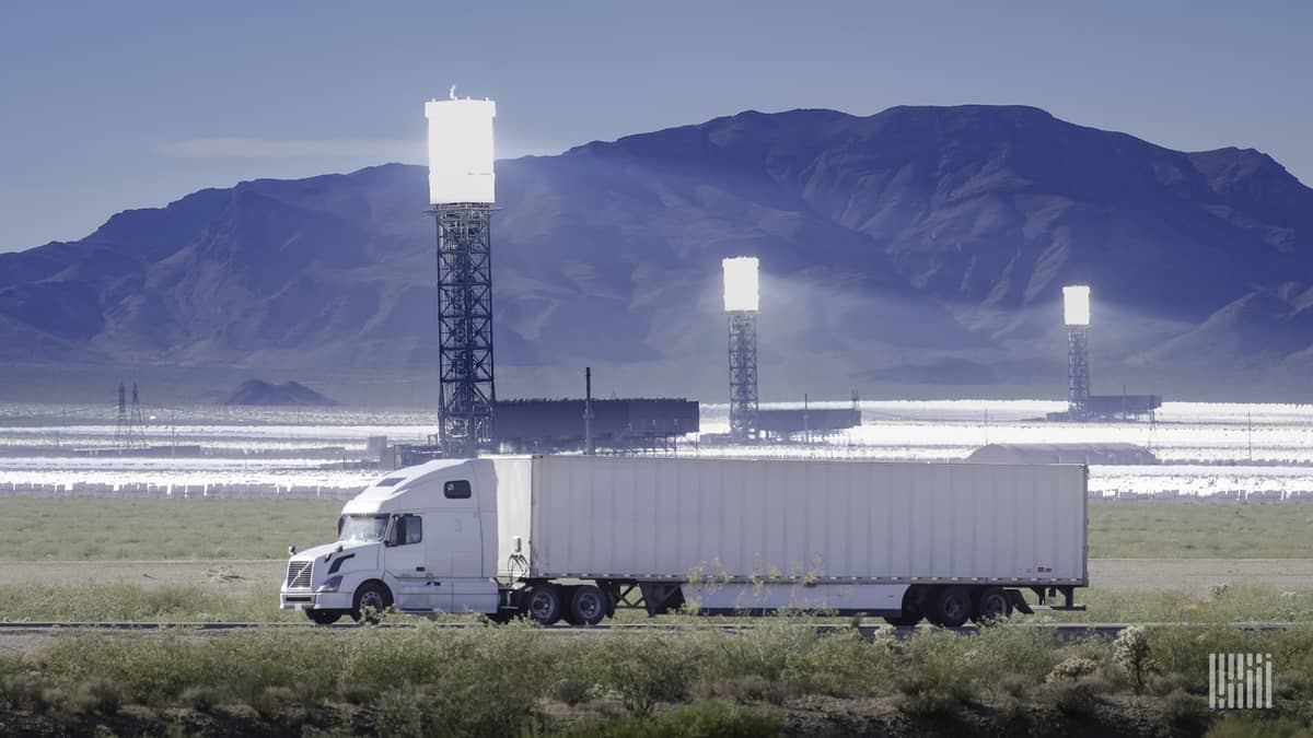 Truck in front of the Ivanpah Solar Electric Generating System, Mojave Desert, California